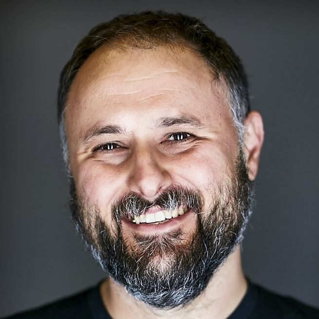 Photo of me, smiling. Taken in 2021